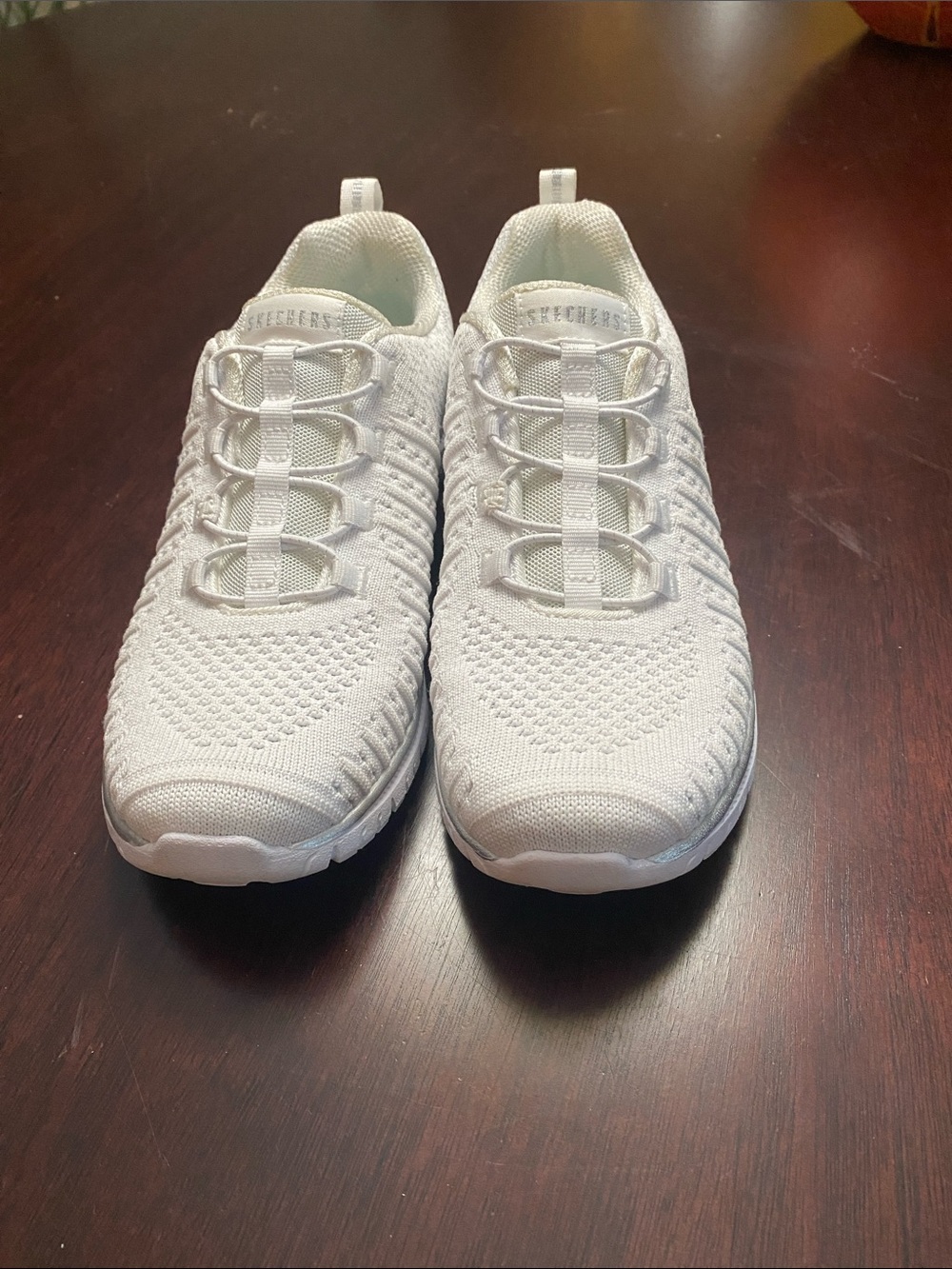 Skechers Women's All-White Slip-On Knit Athletic Sneakers - Picture 4 of 6